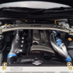 Nissan Skyline GT-R R34 Nismo Z-Tune Λευκό MotorHelix 1:18 - image 9 of 11